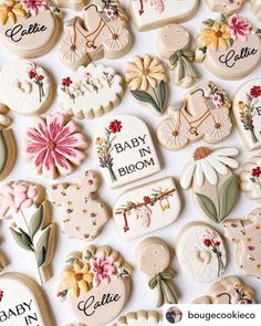 baby in bloom cookies are displayed on a table