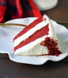 a slice of red velvet cake on a white plate