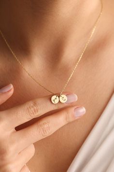 "Gold coin necklace & silver coin necklace are perfect as personalized jewelry. You may design your initial necklace with any letter. This coin jewelry will look so nice on any women.   🎁 Letter necklaces & dainty necklaces also great idea as Valentines Day gifts, Mothers Day gift, birthday gifts, bridesmaid gifts, engagement gifts, couples gifts or any special occasions. 💖 Disc necklaces with engraved necklace style are so popular most loved designs by our customers. ✋All our custom necklaces %100 custom made by hand with Love and Care in our workshop! Nickel Free High Quality Materials Standard Deliver in 8-12 Business Days *How to customize your coin pendant? Leave a not at \"Note to seller\" with name that you would like to have on necklace. Please specify uppercase and lowercase let Personalized Necklace Ideas, Customized Round Jewelry For Everyday, Customized Jewelry For Everyday Wear, Personalized Medallion Jewelry For Her, Personalized Medallion Jewelry Gift For Her, Minimalist Customized Round Jewelry, Personalized Round Charm Necklaces For Best Friend, Personalized Silver Minimalist Coin Necklace, Personalized Charm Necklaces For Best Friend Gift