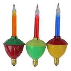 three different colored light bulbs are in the shape of lamps with one bulb turned upside down