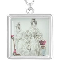 two women in wedding gowns, one wearing a tiara silver plated necklace