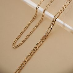 Length: 18" or 22"Width: 3.9mm Thickness: 1.5mm Weight:8.4-10.1g Specs Description: Italian Gold Chain, Gold Figaro Chain, Gold Chain Design, Figaro Chain Necklace, Gold Chain Jewelry, Figaro Chains, Figaro Chain, Gold Bracelet Chain, Jewelry Photography