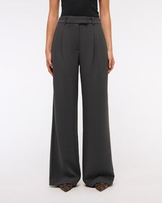 High rise pants in our elevated premium crepe fabric and ultra-wide leg silhouette, that has a slightly fuller leg shape than our Sloane pant. Features a clean fixed waistband, figure-flattering pleat detail, pockets and a functional zipper. 4-way Stretch Wide-leg Pants With Pockets, Stretch High-rise Wide Leg Pants With Pockets, High-waisted Wide Leg Elastane Pants With 4-way Stretch, Stretch Wide Leg Full-length Pants With Welt Pockets, Comfort Stretch Pants With 5-inch Inseam And Pockets, Ultra Wide, Women's Bottoms, High Rise Pants, Crepe Fabric