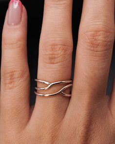 This is a smaller version of our popular Curved Wraparound ring! This ring makes a delicate and minimalist cocktail ring and is also great for everyday wear. This listing is for ONE SINGLE ring in STERLING SILVER. Made from THICK (1.5mm) metal wire.Available in a SMOOTH or HAMMERED finish. This ring is unique and is sure to turn some heads! To make this style, we wrap a length of wire and then securely solder it at two points. Because the metal is not wrapped over itself, like the original Wrapa Minimalist Cocktail, Single Ring, Large Ring, Metal Wire, Cleaning Kit, Ring Sterling Silver, Cocktail Ring, Cleaning Jewelry, Stacking Rings