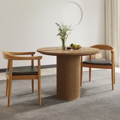 The Japandi Round Small Dining Table is perfect for intimate spaces. It features a sleek walnut wood top and comfortably seats 2-4. Ideal for compact dining areas, small apartments or cozy kitchen corners. Japandi style Pine tabletop and base Fluted texture base Round tabletop For 2-4 people Round Small Dining Table, Walnut Kitchen Table, Kitchen Corners, Walnut Wood Dining Table, Circle Dining Table, Small Round Dining Table, Dining Table Solid Wood, Dining Table For 4, Living Room Nook