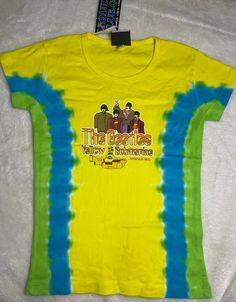 Vintage Liquid Blue Beatles Yellow Submarine tie dye t shirt with print on front. Baby doll style, Size SMALL. Collectible! New/old store inventory. Never worn, not preowned. Vintage but new and never worn! Retro Tie Dye T-shirt With Graphic Print, Fitted Acid Wash T-shirt, Fitted Acid Wash Short Sleeve T-shirt, Y2k Multicolor Cotton T-shirt, Tie Dye Short Sleeve Tops With Sublimation Print, Fitted Acid Wash T-shirt With Graphic Print, Summer Fitted Acid Wash T-shirt, Fitted Acid Wash Cotton T-shirt, Multicolor Cotton Band Merch Tops