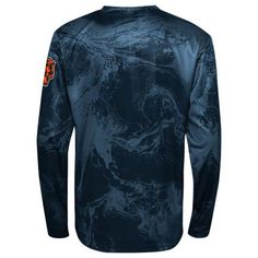 the back of a men's long - sleeved shirt with an orange and black design