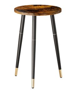 a small wooden table with two black legs and gold accents on the top, against a white background