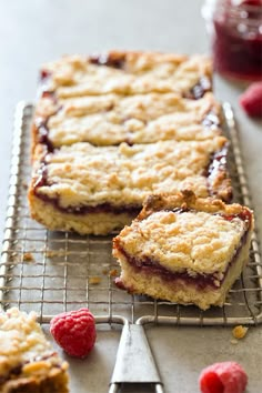 raspberry crumb bars cooling on a rack