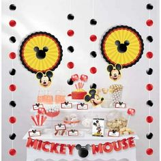 mickey mouse dessert table with red and black decorations