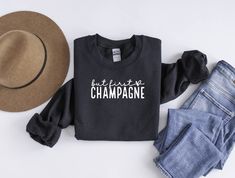 But Champagne First, New Years Sweatshirt, Cheers Sweatshirt, 2023 and 2024 Sweatshirt, NYE A soft and warm unisex sweatshirt sure to keep you warm in the colder months. A pre-shrunk, classic fit sweater that's made with air-jet spun yarn for a soft feel and reduced pilling. Sweatshirts are Gildan. Pull Bleu Marine, Flat Lays, Christian Sweatshirt, Navy Sweater, Cheer Mom, Navy Sweaters, Mock Up, Tee Shop, Dark Navy