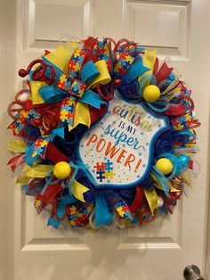 Puzzle Wreath, Booth Setup Ideas, Awareness Wreaths, Wreath Centers, Deco Mesh Wreath Ideas, Awareness Wreath, Decorative Mesh Wreaths, Diy Deco Mesh Wreath, Mesh Wreath Ideas