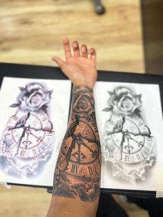 a person's arm with tattoos on it and two different colored clocks behind them