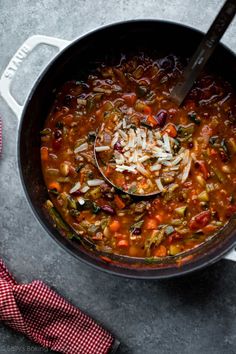 a large pot filled with soup on top of a table