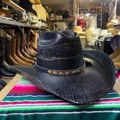 Really nice men's black cowboy hat perfect for any occasion! Solid strong, durable, and comfortable ideal for any event and activity. Made with breathable material with ventilated ports to stay cool and feel the breeze. Water & sweat proof made to protect and keep cool during any weather as well keep you cool. Has an elastic band for a nice comfort fit made 100% from Mexico! Available in all sizes small- X Large!  Sizing: Small - 6 7/8 (55 cm) Medium - 7 (56 cm) & 7 1/8 (57 cm) Large - 7 1/4 (58 Black Western Top Hat For Ranch, Black Western Style Top Hat For Ranch, Wide Brim Black Hat For Ranch, Western Style Black Top Hat For Western-themed Events, Black Wide Brim Hat For Ranch, Western Black Hat Band For Western-themed Events, Black Fedora Hat For Ranch, Black Fedora For Ranch, Black Short Brim Hat For Ranch