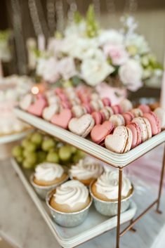 there are many different types of pastries on the trays and in front of each other