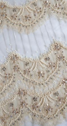 Beaded Tulle Hand embroidered tulle with lace appliqué | Etsy Lace Embroidery Pattern, Elegant Beige Embellished Embroidered Fabric, Elegant Festive Lace With Floral Embroidery, Festive Elegant Lace With Floral Embroidery, Elegant Floral Embroidered Lace For Festive Occasions, Elegant Embellished Embroidered Organza Fabric, Elegant Embroidered Organza Lace, Elegant Embroidered Lace Tulle Fabric, Elegant White Embellished Tulle Fabric