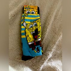 2 Pairs Of Sponge Bob Long Socks Fits Shoe Sizes 6 - 12. Material: 97% Polyester & 3% Spandex Fun Yellow Cotton Socks, Spongebob Faces, Spongebob Square, Rocko's Modern Life, Garfield And Odie, Nickelodeon Spongebob, Teenage Mutant Ninja Turtle, Mens Crew Socks, Patrick Star