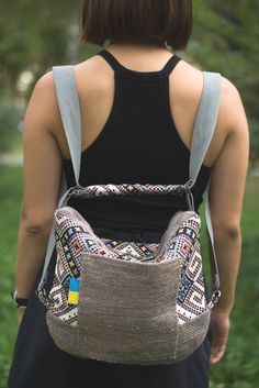 "Womens burlap bag-backpack made of natural textile \"Pearl\"handmade in ethnic bag style. This original convertible backpack that becomes a small crossbody bag is ideal if you are looking for something really high-quality, beautiful and unique. The combination of decorative burlap with tapestry adds authenticity. The shoulder bag includes quality materials:burlap, cotton, tapestry ,YKK zipper, WJ key carabiner . Width-35 cm/13.77\". height-32 cm/12,59\".The size of the bag can vary by +- 0.5см. The Fabric backpack transformer is very convenient to use: it has four pockets. One outer pocket that does not close. Three pockets inside, one of the zippered pockets, the second pocket that does not close and the third a small pocket for keys. There is a rope with a carabiner in the bag for keys Canvas Travel Bag, Ethnic Bag, Canvas Crossbody Bag, Convertible Backpack, Natural Textiles, Small Crossbody, Small Backpack, Small Crossbody Bag, Canvas Shoulder Bag