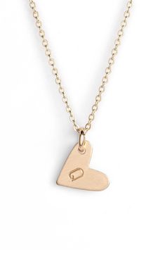 From humble beginnings to a fully staffed warehouse in Oregon, Nashelle remains true to its original purpose-handmade jewelry crafted with love and intention. The heart initial necklace is no different-with a hand-stamped pendant anchored by a single ring, it makes for a perfect layering piece. Style Name:Nashelle 14K-Gold Fill Initial Mini Heart Pendant Necklace. Style Number: 5143637. Available in stores. Dainty Engraved Heart Necklace For Everyday, Minimalist Hand Stamped Heart Pendant Jewelry, Simple 14k Gold Jewelry With Heart Charm, Everyday Gold Initial Necklace With Heart Charm, Gold Initial Necklace With Heart Charm For Everyday, Minimalist Heart Charm Jewelry For Mom, Everyday Hand Stamped Heart Pendant Jewelry, Minimalist Heart Charm Jewelry For Anniversary, Simple Heart Charm Jewelry For Mother's Day