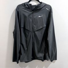 Never Worn!! Men’s Nike Windrunner Jacket Black/Black Xl Tall Black Windproof Windbreaker For Sports, Nike Urban Black Track Jacket, Nike Black Track Jacket With Pockets, Nike Black Track Jacket For Outdoor Activities, Nike Black Sportswear Windbreaker, Moisture-wicking Black Gym Outerwear, Nike Black Athleisure Windbreaker, Nike Urban Outerwear For Gym, Nike Black Sporty Windbreaker