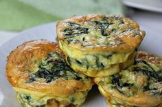 three mini quiches on a white plate