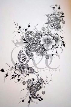 an artistic tattoo design with flowers and swirls on the side of a white wall