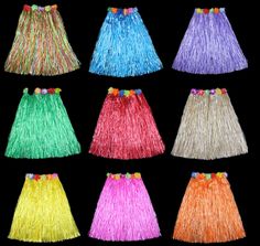 six different colors of grass skirts with flowers on the bottom and one is multicolored