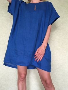 "Loose linen tunic with pockets. Great choice when you need comfortable and stylish outfit combination. You can wear it with trousers, leggings, shorts, skirts. The good thing about tunics is that you can wear them also by themselves with nothing or for example as beach cover ups. Linen tunic dress is perfect for warm days and vacation. As linen regulates body temperature, is lightweight and really absorbent, which makes it the perfect fabric for summer. ABOUT Length of this linen tunic in front Short Sleeve Relaxed Fit Tunic For Beach, Relaxed Fit Short Sleeve Tunic For Beach, Flax Linen Summer Dress For The Beach, Vacation Linen Dress With Short Sleeves And Relaxed Fit, Flax Linen Summer Dress For Beach, Short Sleeve Linen Beach Dress With Relaxed Fit, Summer Flax Linen Dress For Beach, Relaxed Fit Short Sleeve Linen Dress For Vacation, Blue Relaxed Fit Summer Tunic