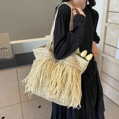 Elevate your summer style with the Andreia Long Tassel Straw Bag! Made from high-quality straw, this bag features a chic tassel design and spacious interior, perfect for carrying all your essentials. Whether you're headed to the beach or a brunch date, this bag will add a touch of bohemian luxury to any outfit. SIZE: W44cm x H38cm x D8cm / W17.3" x H15" x D3.2" Gender: WOMEN Item Type: Handbags & Shoulder Bags, Straw Bags Main Material: Straw Pattern Type: Knitting, Tassels Lining Material: POLY Trendy Fringe Shoulder Bag For Spring, Casual Fringe Beach Bag For Daily Use, Trendy Beige Shoulder Bag With Fringe, Daily Use Fringe Tote Beach Bag, Casual Fringed Beach Bag, Chic Summer Bags With Fringe, Rectangular Tassel Bags For Spring, Chic Summer Fringe Bags, Spring Travel Bag With Tassels