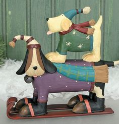 a figurine of a dog on a sled