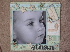 a child's face is shown in the middle of a frame with stars on it