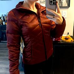 The North Face Women’s Puffer Jacket Tapered Cut That Hugs Your Waist And Hips And Shows Some Curve, Very Flattering Red/Bronze Chrome-Ish Color. Reflects A Lot Of Light Super Warm. I Wore It For A Snow Trip Gently Used A Couple Times Bought For $200 North Face Coat, Snow Trip, Couple Time, North Face Women, North Face Jacket, Hug You, The North Face, Puffer, Jackets For Women