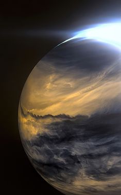 an image of the sun and clouds in space