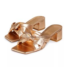 PRICES MAY VARY. Elegant Gold Mule Heels: These heeled mules for women feature a stunning Gold finish and a charming bow detail, making them perfect for summer dress shoes. The square open toe adds a modern touch to your ensemble. Comfortable Chunky Heel Mules: Designed with a chunky low heel, these sandals offer stability and comfort for all-day wear. The slip-on style ensures ease and convenience, making them ideal for any occasion. Versatile Gold Heels: These Gold heels sandals are perfect fo Gold Mules, Heels Bow, Summer Dresses Shoes, Summer Slides, Mule Heels, Women Heels, Heel Mules, Low Heel Sandals, Bow Heels