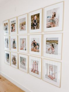 a white wall with many pictures hanging on it's sides and wooden flooring