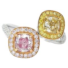 18kt white gold ring with diamonds Gold colour & karat: White gold 18kt Weight: 3.89 grams Set with- Stone type: Diamonds Shape: Cushion / Cushion Carat: 0.50 / 0.53 Colour: Fancy Light Brownish Yellow / Faint Pink Clarity: SI1 / VS2 Surrounding Stones: Diamonds 1) White Diamonds Carat weight: 0.282 ct (54 pcs) Color: F Clarity: VS1/VS2 Cut: Round 2) Side Pink Diamonds Carat weight: 0.134 ct (20 pcs) Color: Pink Clarity: VS1/VS2 Cut: Round 3) Side Yellow Diamonds Carat weight: 0.03ct (08 pcs) Co Platinum Rings With Yellow Diamond Accents, Yellow Platinum Rings With Diamond Accents, Yellow Platinum Diamond Ring With Halo Setting, Yellow Brilliant Cut Platinum Ring, Yellow Platinum Ring With Prong Setting, Brownish Yellow, Fancy Light, Pink Diamonds, Yellow Diamonds