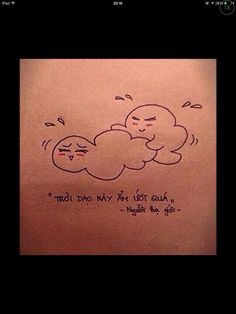 a drawing of two clouds with faces on them