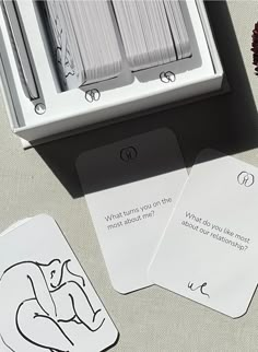 three cards with the words what do you think about marriage? written on them next to a box