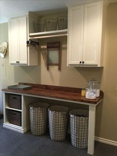 the laundry room is clean and ready to be used as a storage area for clothes