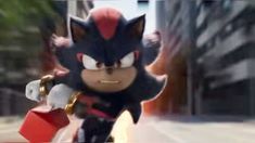 sonic the hedgehog from mario kart in an animated video game with blurry background