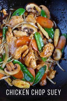 chicken and vegetable stir fry in a wok with the words chicken chop suey