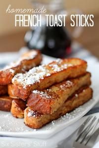 french toast sticks on a plate with powdered sugar