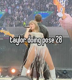 taylor and taylor performing on stage with the words taylor doing pose 28