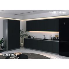 black matte kitchen cabinets with lights on the ceiling and counter tops, along with a potted plant