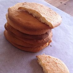 a stack of cookies sitting on top of a piece of paper