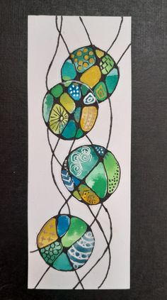 a card with some colorful rocks on it