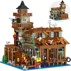 a lego model of a wooden house with lots of windows and balconies on the roof