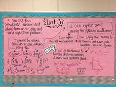 a pink bulletin board with writing on it