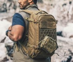 a man with a beard wearing a backpack